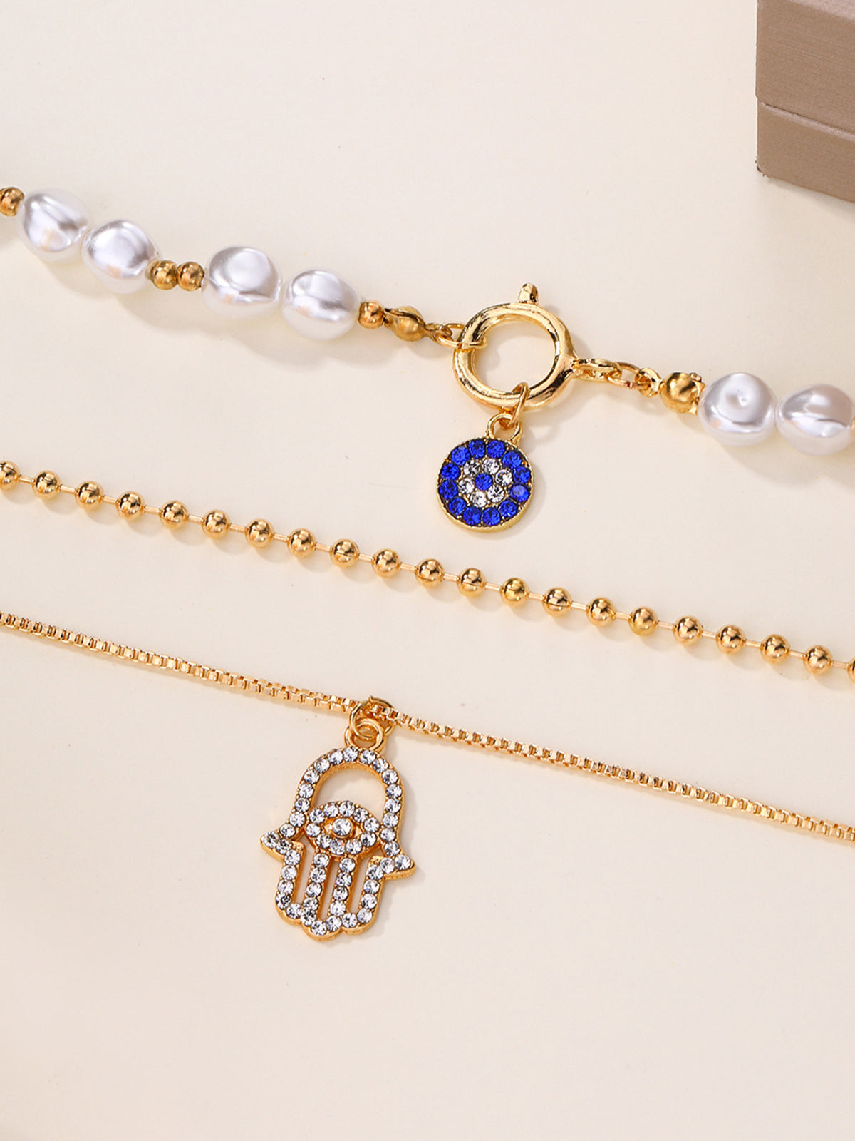 İnci ve Hamsa El Desenli Kolye Seti